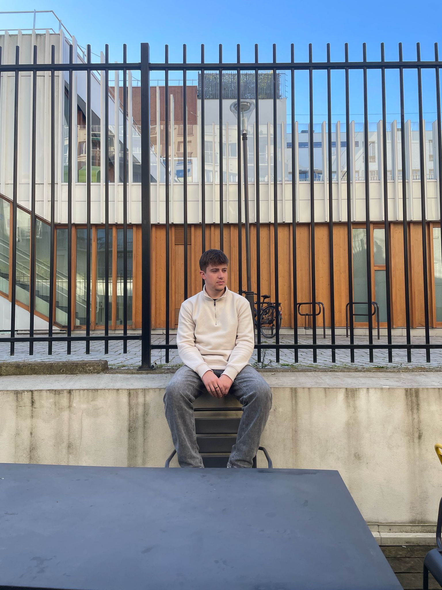 Me sitting in front of the school